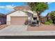 Charming two-story home featuring a well-maintained front yard and attached two-car garage at 3644 Shanagolden St, Las Vegas, NV 89129