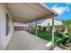 Relax on this covered patio, which offers shade, green grass, and a connection to the outdoors at 3644 Shanagolden St, Las Vegas, NV 89129