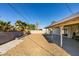 This home features a large backyard with stone landscaping and a covered patio at 3700 Hickey Ave, North Las Vegas, NV 89030