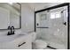 This bathroom is fully remodeled with new vanity, sink, toilet and glass shower at 3700 Hickey Ave, North Las Vegas, NV 89030
