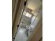 Updated bathroom features a shower-tub combo, marble style tile and modern fixtures at 3700 Hickey Ave, North Las Vegas, NV 89030