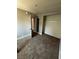 Neutral toned bedroom with an open closet and carpeted floors at 3700 Hickey Ave, North Las Vegas, NV 89030