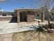 Cozy single-story home featuring stone accents, a covered parking area, and a low-maintenance front yard at 3700 Hickey Ave, North Las Vegas, NV 89030