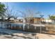 Charming single-story home with decorative front fence and easy-care landscaping in a residential neighborhood at 3700 Hickey Ave, North Las Vegas, NV 89030