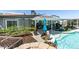 Beautiful backyard boasts a pool, garden, patio, and other outdoor living spaces at 386 Summer Creek Ct, Henderson, NV 89002