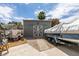 Backyard with shed and boat on trailer with visible gravel at 386 Summer Creek Ct, Henderson, NV 89002