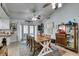 Dining area featuring french doors, tile floors, and farmhouse accents at 386 Summer Creek Ct, Henderson, NV 89002