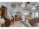 Open dining area with wood table, tile floors, and rustic decor at 386 Summer Creek Ct, Henderson, NV 89002