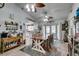 Charming dining room with a wooden table, modern decor, and access to the kitchen at 386 Summer Creek Ct, Henderson, NV 89002