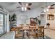 Open-concept dining room with french doors and bright interior at 386 Summer Creek Ct, Henderson, NV 89002