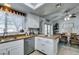 Spacious kitchen boasts butcher block countertops, stainless appliances, and dining area at 386 Summer Creek Ct, Henderson, NV 89002