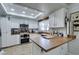 Well-lit kitchen featuring white cabinetry and ample countertop space at 386 Summer Creek Ct, Henderson, NV 89002