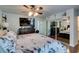 Main bedroom featuring a ceiling fan, closet and outdoor access at 386 Summer Creek Ct, Henderson, NV 89002