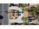 Aerial view of a landscaped circular driveway with palm trees, enhancing curb appeal and providing ample parking at 4012 Vegas Dr, Las Vegas, NV 89108