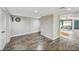 Spacious basement area with tile floors, brick accents, and an open floor plan at 4012 Vegas Dr, Las Vegas, NV 89108