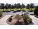 Landscaped front yard overlooking the adjacent golf course at 4012 Vegas Dr, Las Vegas, NV 89108