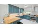 Modern kitchen featuring butcher block countertops and stainless steel appliances at 4012 Vegas Dr, Las Vegas, NV 89108
