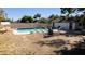 Refreshing swimming pool with lounge chairs, perfect for relaxation and enjoying the outdoors in a private backyard setting at 4012 Vegas Dr, Las Vegas, NV 89108