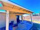 This backyard features a covered patio and block wall providing privacy at 4016 Calle Paula, Las Vegas, NV 89103