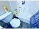 Compact bathroom featuring a combination tub/shower with wood-look floors at 4016 Calle Paula, Las Vegas, NV 89103
