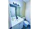 Clean bathroom featuring a vanity with ample counter space, sink, and walk-in shower at 4016 Calle Paula, Las Vegas, NV 89103
