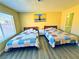 Comfortable bedroom with twin beds and an abundance of natural light at 4016 Calle Paula, Las Vegas, NV 89103