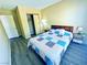 Comfortable bedroom with a quilted bedspread and closet at 4016 Calle Paula, Las Vegas, NV 89103
