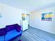 Comfortable bedroom with gray floors, modern chest of drawers, and cozy lighting at 4016 Calle Paula, Las Vegas, NV 89103