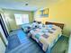 Bright bedroom with twin beds and a view of the backyard at 4016 Calle Paula, Las Vegas, NV 89103
