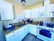 The kitchen features white cabinets, granite countertops, and modern appliances at 4016 Calle Paula, Las Vegas, NV 89103