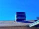 Rooftop air conditioning unit on the roof of the home against a sunny blue sky at 4016 Calle Paula, Las Vegas, NV 89103