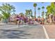 Community featuring a controlled entrance and surrounding buildings at 4050 Pacific Harbors Dr # 112, Las Vegas, NV 89121