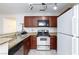 Well-equipped kitchen with stainless steel appliances, granite countertops, and ample lighting at 4050 Pacific Harbors Dr # 112, Las Vegas, NV 89121