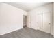 Carpeted room features an attached closet and ensuite access at 4071 Blue Manor Ln, North Las Vegas, NV 89032