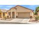 Charming single-story home featuring a low maintenance front yard and attached two car garage at 4071 Blue Manor Ln, North Las Vegas, NV 89032