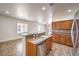 Bright kitchen with stainless steel appliances and peninsula at 4071 Blue Manor Ln, North Las Vegas, NV 89032