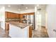 Eat-in kitchen featuring stainless steel appliances, gas range, and breakfast bar at 4071 Blue Manor Ln, North Las Vegas, NV 89032