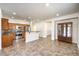 Open-concept kitchen with stainless appliances and a tile backsplash at 4071 Blue Manor Ln, North Las Vegas, NV 89032
