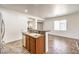 Open kitchen with stainless steel dishwasher and tile floors at 4071 Blue Manor Ln, North Las Vegas, NV 89032