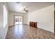 Living area with sliding door and a decorative fireplace at 4071 Blue Manor Ln, North Las Vegas, NV 89032