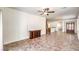 Open concept living space with modern tile floors and plenty of light at 4071 Blue Manor Ln, North Las Vegas, NV 89032