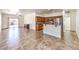 Spacious living area with sliding glass doors and modern tile flooring at 4071 Blue Manor Ln, North Las Vegas, NV 89032