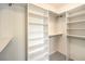 Organized walk-in closet features built-in shelving and ample storage space at 4071 Blue Manor Ln, North Las Vegas, NV 89032