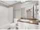 Bright bathroom featuring a shower-tub combo and modern fixtures at 45 Maleena Mesa St # 1424, Henderson, NV 89074