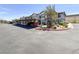 Exterior view of the assigned, covered parking area and well-maintained landscaping at 45 Maleena Mesa St # 1424, Henderson, NV 89074