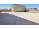 Large backyard with space to make it your own, and an oversized privacy wall at 4630 Adonis Blue St, North Las Vegas, NV 89031