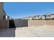 Backyard featuring block wall fencing and a metal gate to the alley at 4630 Adonis Blue St, North Las Vegas, NV 89031