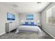 This primary bedroom offers great natural light, carpet and a serene space at 4630 Adonis Blue St, North Las Vegas, NV 89031