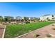 Well-kept community park featuring green lawns and fun playground equipment at 4630 Adonis Blue St, North Las Vegas, NV 89031