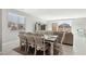 Inviting dining area with seamless flow into the adjacent living space for easy entertaining at 4630 Adonis Blue St, North Las Vegas, NV 89031